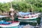 BOCA DE MIEL, CUBA - FEB 4, 2016: Fishing boats anchored at Rio Miel river mouth near Baracoa, Cu