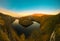 Bocac Lake beneath a gorgeous blue sky in Bosnia and Herzegovina