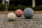 Bocce Balls on Gravel White in Focus