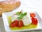 Bocconcini cheese, baby tomato and olive oil