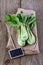 Bock Choy over rustic wooden background