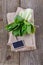 Bock Choy and tag over rustic wooden background
