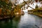 Bodensee channel and embankment with nice trees in public park, Konstanz, Germany