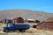 Bodie, CA, September 6, 2018: old houses and cars in the abandoned town of Bodie.