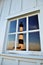 Bodie Lighthouse reflected in window