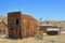 Bodie State Historic Park, Swazey Hotel  and Old Wooden Houses and Cart in Ghost Town, Eastern Sierra, California, USA