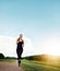 The body achieves what the mind believes. a fit young woman out for a run on a beautiful day.