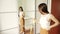 Body care, beauty, healthy eating, teen girl in front of the mirror measures her waist with a ribbon