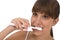 Body care - Female teenager brushing teeth