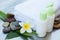 Body care and spa concept with bottles and flower and stones