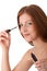 Body care - Young woman apply mascara