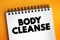 Body cleanse text on notepad, concept background