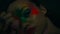 Body paint, art and face of creative woman in the dark, abstract makeup and neon fantasy on a studio background