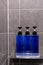 Body Wash, Shampoo, and Conditioner are packed in blue bottles