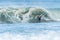 Bodyboarder surfing ocean wave