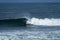 Bodyboarder surfing ocean wave