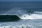 Bodyboarder surfing ocean wave