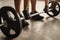 Bodybuilder doing weightlifting exercise with barbell