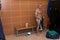 Bodybuilder In Dressing Room - Undressing His Clothing