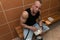 Bodybuilder Eating Healthy Diet Food Out Of Tupperware