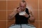 Bodybuilder Eating Healthy Diet Food Out Of Tupperware