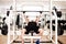 Bodybuilder training in the gym: chest - barbell bench press