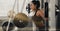 Bodybuilder woman barbell weight lifting in gym and fitness club