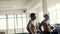 Bodybuilders taking a break after intense workout at gym