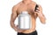 Bodybuilding and Sports theme: handsome strong bodybuilder holding a plastic jar with a dry protein and showing gesture isolated o