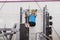 Bodybuilding. Strong fit woman exercising in a gym - doing pull-ups.