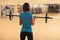 Bodybuilding. woman exercising with barbell. girl lifting weights in gym