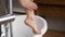 Bodycare Concept. Closeup Shot Of Unrecognizable Woman Scrubbing Legs In Bathroom