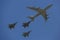 Boeing 707 refueling tanker in formation with F-15I all-weather multi role strike fighter during Israel`s Annual Independence Day