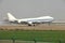 A boeing 747 cargo landing on the runway