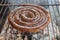 Boerewors sausage on a South African braai