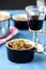 Boeuf bourguignon classic french beef stew on blue table with a