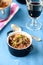 Boeuf bourguignon classic french beef stew on blue table with a