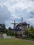 Bogor, Indonesia - August 13 2022: european style building with two windmills in Cimory Dairyland