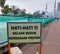 Bogor, Indonesia- February 4 2020:sign board that reads to be careful because of the entry and exit lanes for the project vehicle