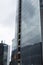 BOGOTA, COLOMBIA Closeup to a moder building construction elevator with blue sky reflection windows