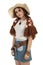 Bohemian festival style attractive model wearing a blank white t-shirt and cowboy hat