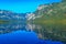 Bohinj lake with Julian Alps reflecting on surface