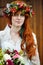Boho bride with red hair with flowers