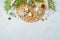 Boho Christmas background with decorations and green leaves. Top view, flat lay