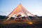 Boho wedding tent in the open air for the bride and groom.