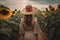 boho woman in hat seen from behind . sunflowers field , ai generative