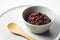 Boiled azuki beans placed on a white background