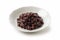 Boiled azuki beans placed on a white background