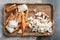 Boiled blue swimming crab claws, on gray background, top view flat lay