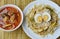 Boiled brown egg and stir fried bean sprout with spicy pork leg soup